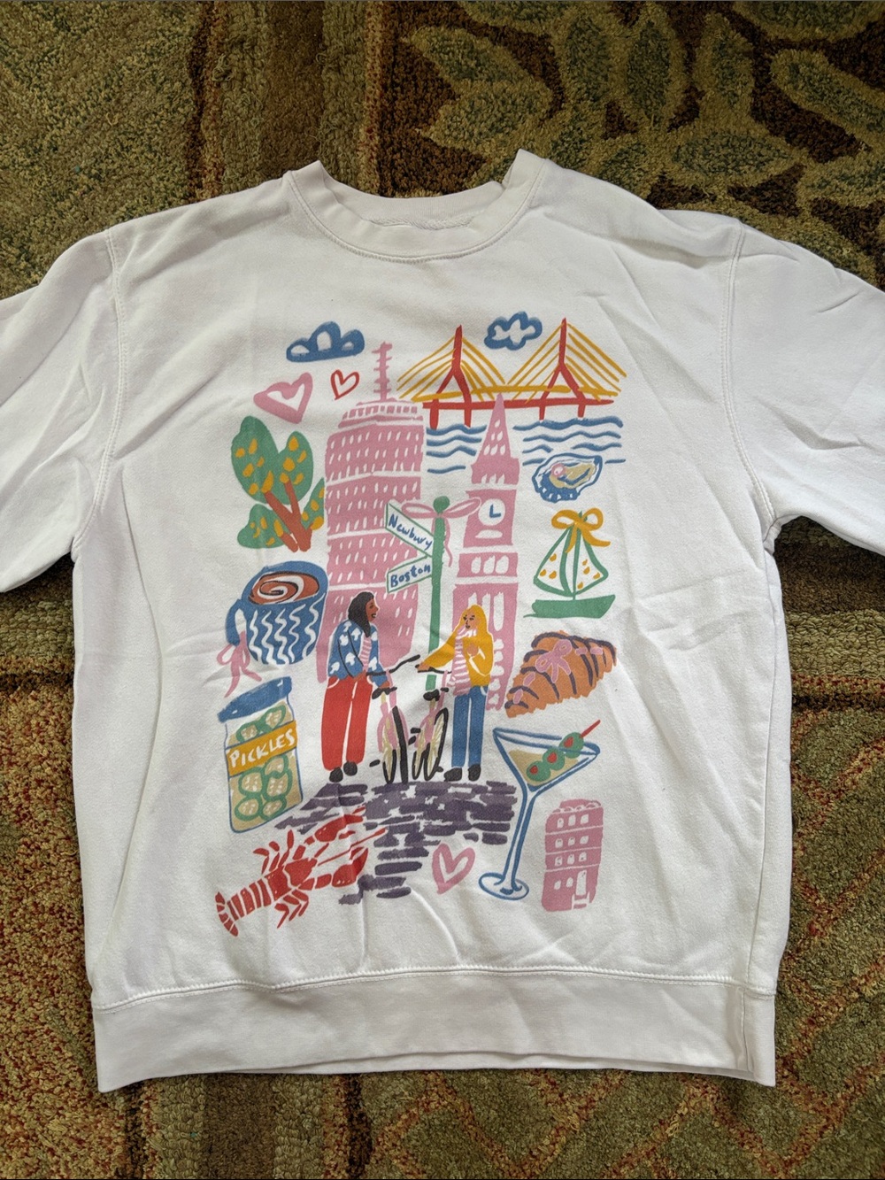 White Women's Graphic Sweatshirt with Colorful City Illustration